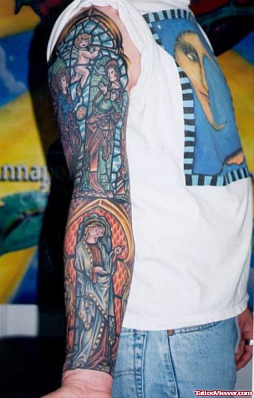 Religious Colored Ink Elbow Tattoo