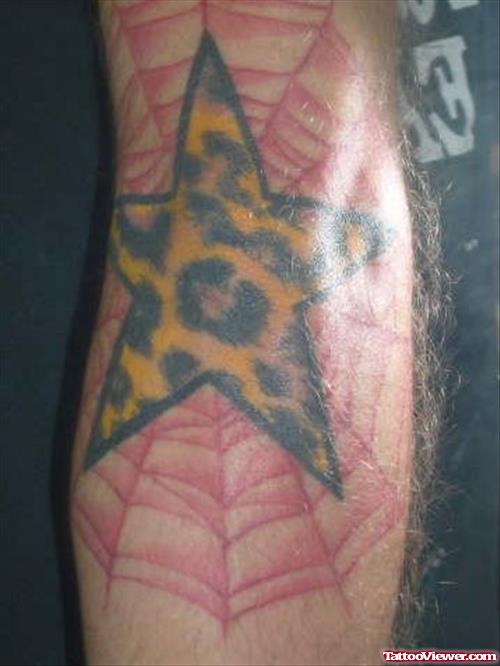 Leopard Star And Spider Web Elbow Tattoo