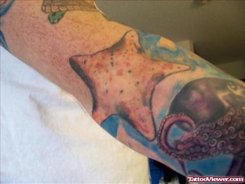 star Fish Elbow Tattoo