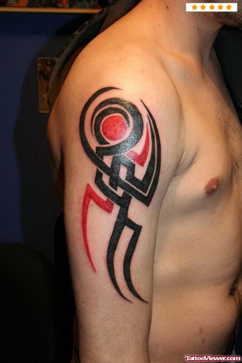 Red And Black Tribal Elbow Tattoo