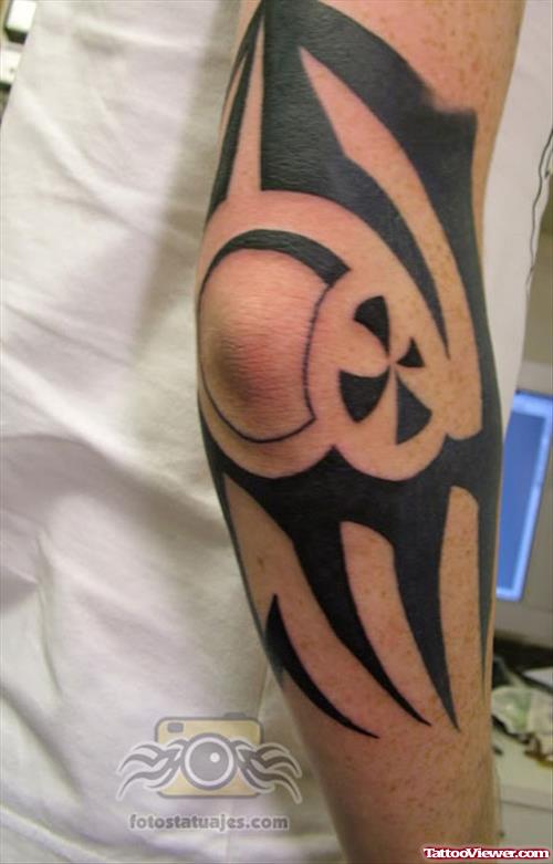 Black Tribal Elbow Tattoo
