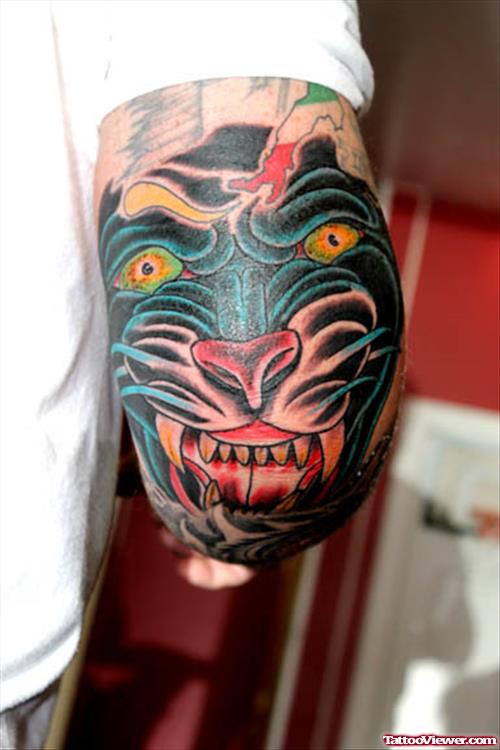 Panthert Head Elbow Tattoo