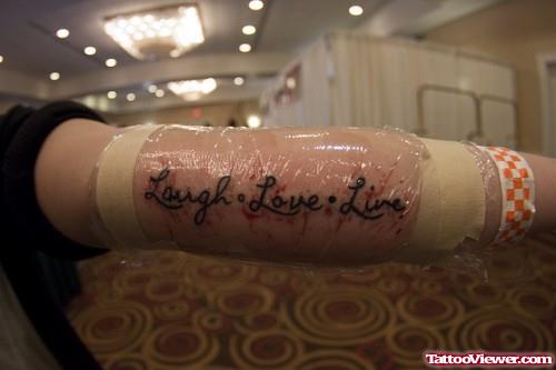 Laugh Love Live Elbow Tattoo
