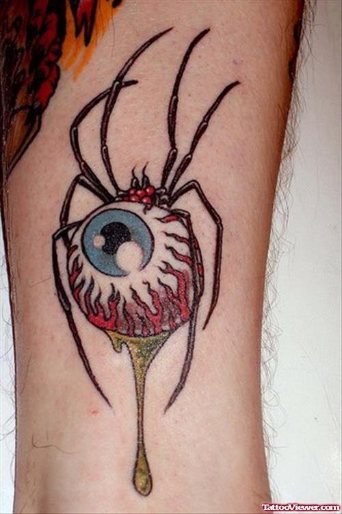 Eyeball Spider Elbow Tattoo