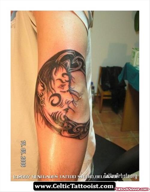 Celtic Moon And Elbow Tattoo