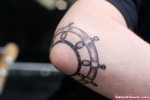 Grey Ink Ship Compass Elbow Tattoo