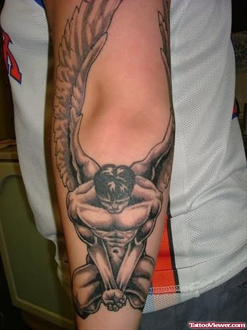 Grey Ink Angel Guy Elbow Tattoo