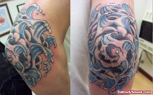 Blue Ink Floral Elbow Tattoo