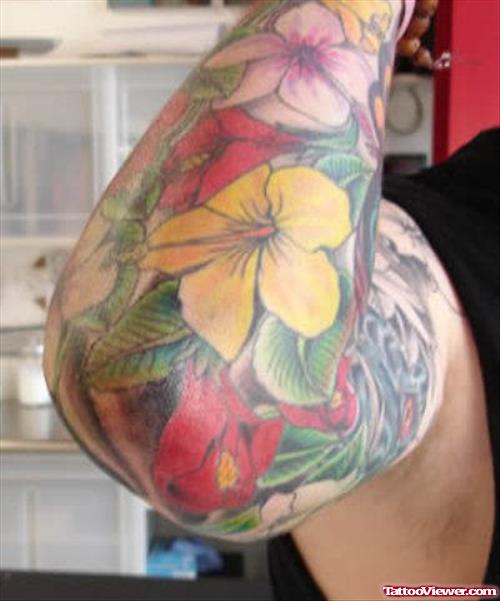 Colored Lily Flowers Elbow Tattoo