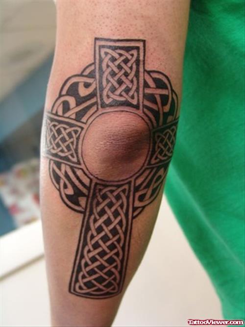 Celtic Cross Elbow Tattoo