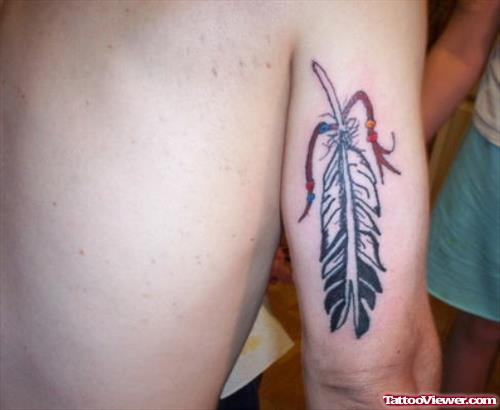 Black Feather Elbow Tattoo