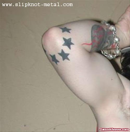 Beautiful Black Stars Elbow Tattoo