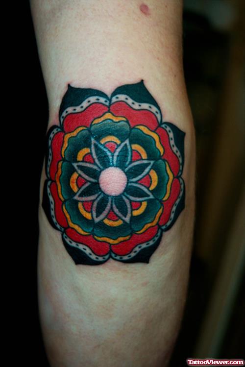 Awesome colored Flower Elbow Tattoo Design
