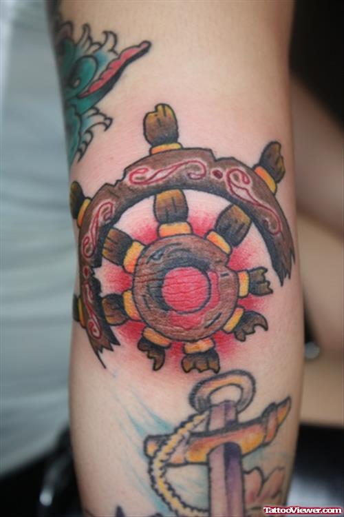Anchor And Ship Wheel Sterring Elbow Tattoo