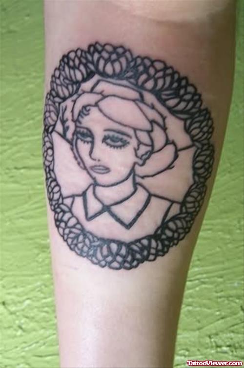 Girl Face Tattoo On Elbow