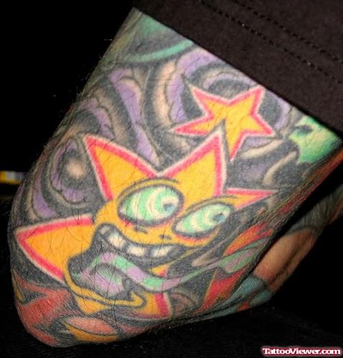 Yellow Star Tattoo On Elbow