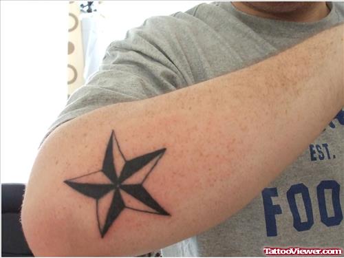 Nautical Star Tattoo On Elbow