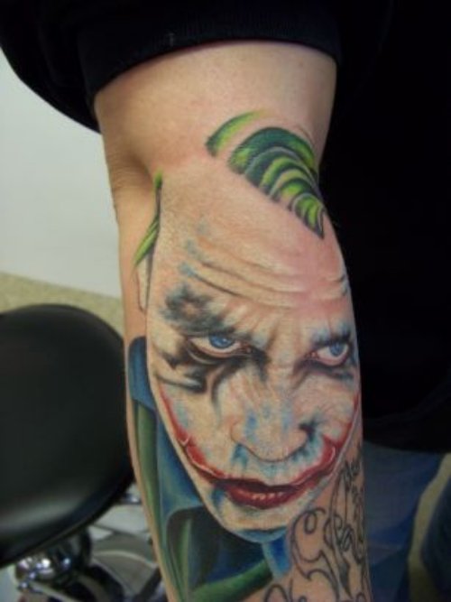 Joker Face Elbow Tattoo