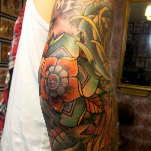 Colored Flower Elbow Tattoo