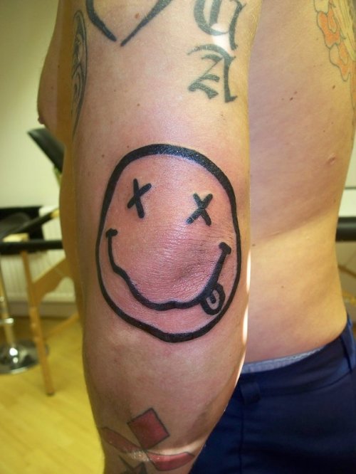Pirate Smiley Elbow Tattoo
