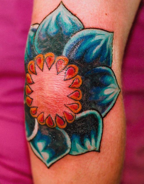 Elbow Lotus Flower Tattoo