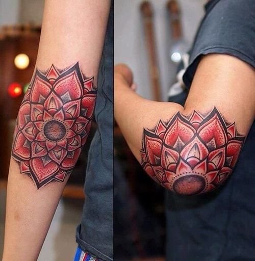 Red Mandala Flower Tattoo On Elbow