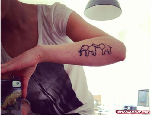 Two Elephant Tattoos On Left Forearm
