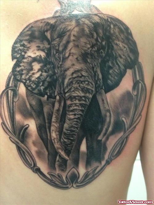 Dark Ink Elephant Tattoo On Back