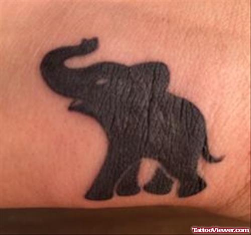 Black Elephant Tattoo On Wrist