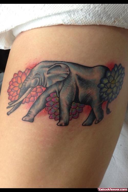 Red And Blue Flowers Elephant Tattoo