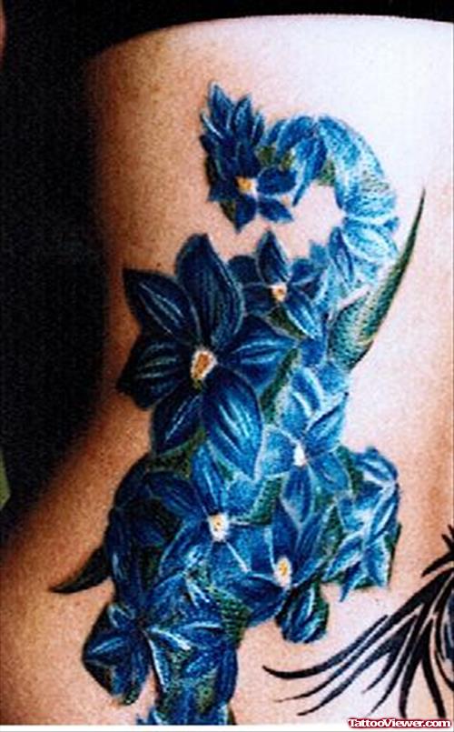 Blue Flowers Elephant Tattoo On Side