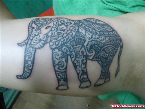 Grey Ink Elephant Tattoo On Bicep