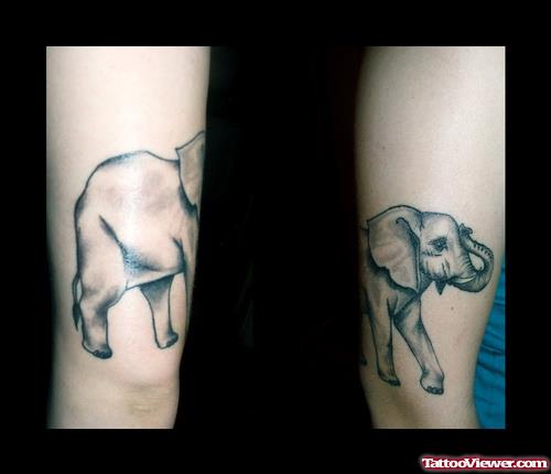 Grey Ink Elephant Tattoo On Right Bicep