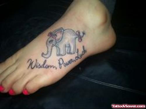 Cute Small Elephant Tattoo On Girl Left Foot