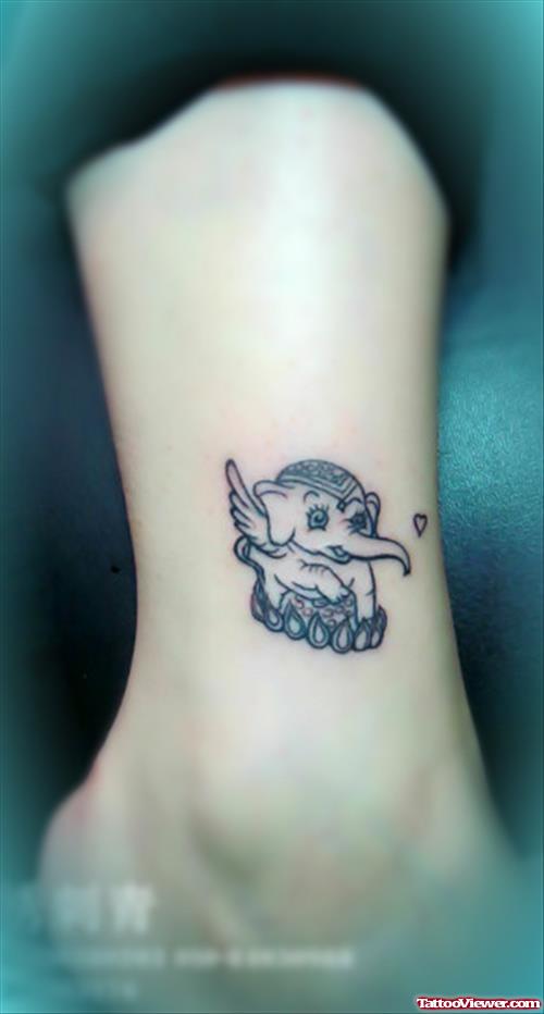 Winged Elephant Tattoo On Ankle