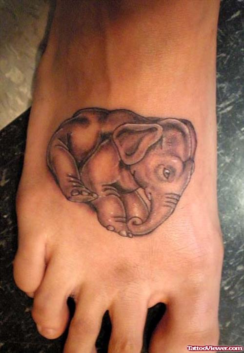 Grey Ink Elephant Tattoo On Right Foot