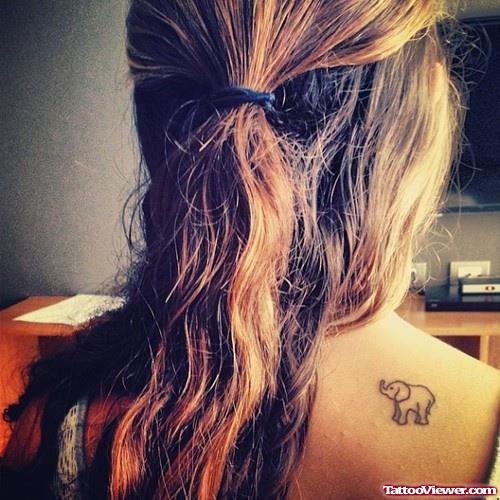 Tiny Elephant Tattoo On Girl Back Shoulder