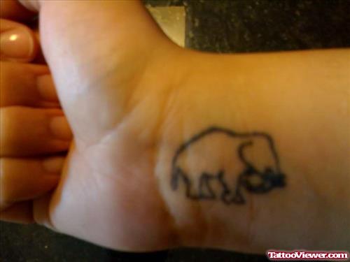 Outline Small Elephant Tattoo On Wrist