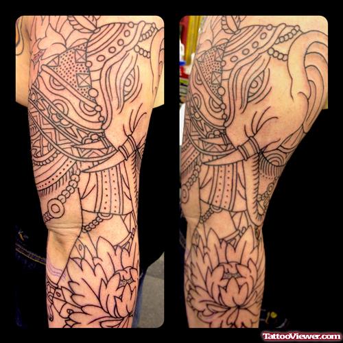 Outline Flower And Elephant Tattoo On Shoulder