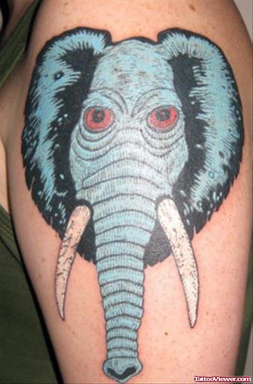 Blue Ink Elephant Head Tattoo