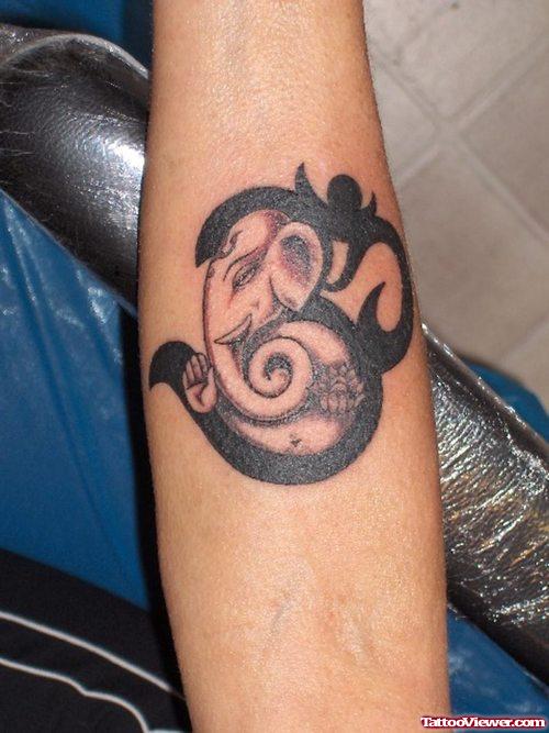 Black Om Symbol and Elephant Tattoo On Arm