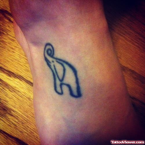 Outline Small Elephant Tattoo