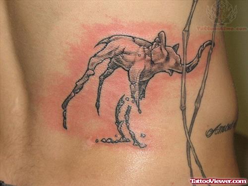 Dali Elephant Rib Side Tattoo