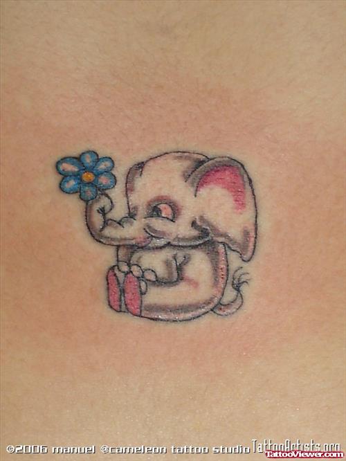 Cute Little Elephant Tattoo With Blue Flower