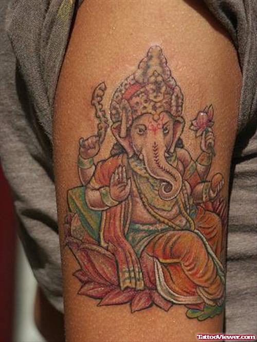 Color Lotus Flower And Elephant Head God Ganesha Tattoo