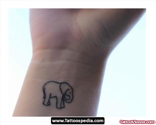 A Small Elephant Tattoo On Wrist