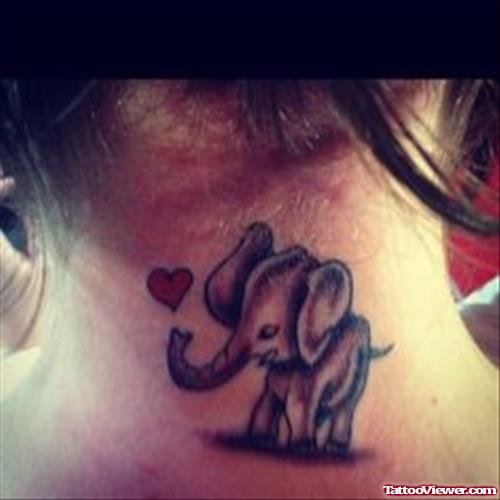 Latest Tiny Red Heart And Elephant Tattoo On Nape