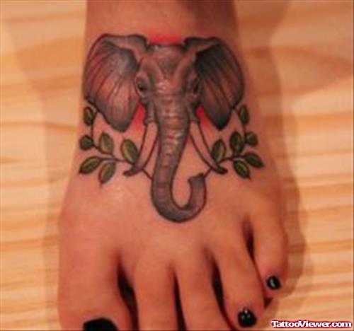 Grey Ink Elephant Head Tattoo On Left Foot