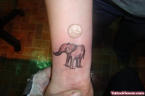 Small Grey Ink Elephant Tattoo On Wrist