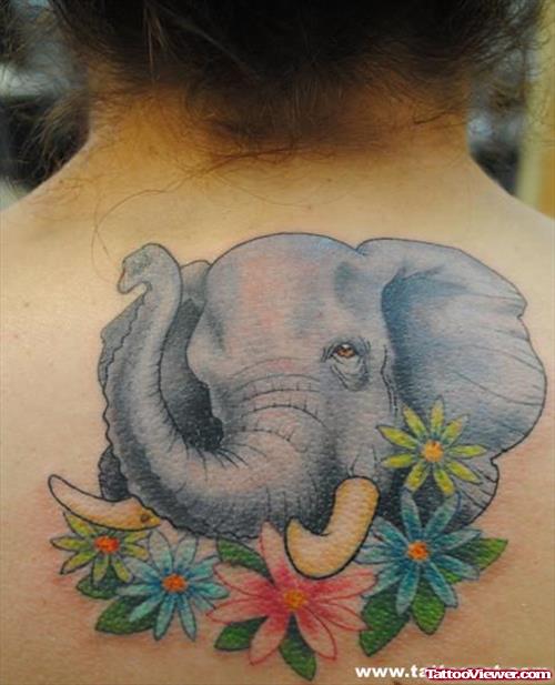 Beautiful Colored Flowers And Elephant Head Tattoo